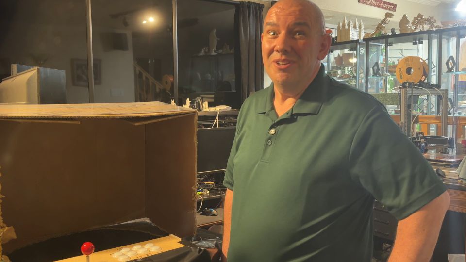 The developer beside the finished cabinet